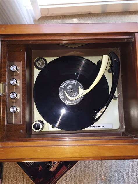 The <strong>record player</strong> works but needs to be cleaned. . Magnavox record player